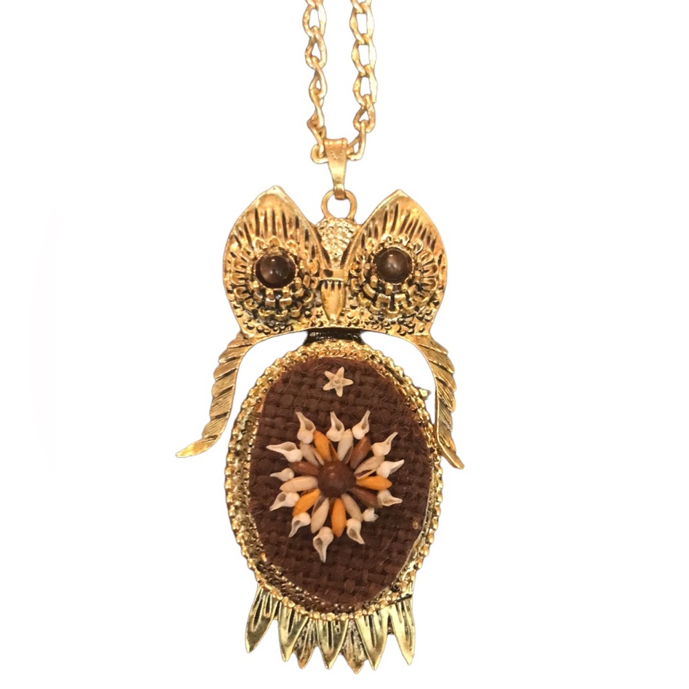 Articulating owl pendant